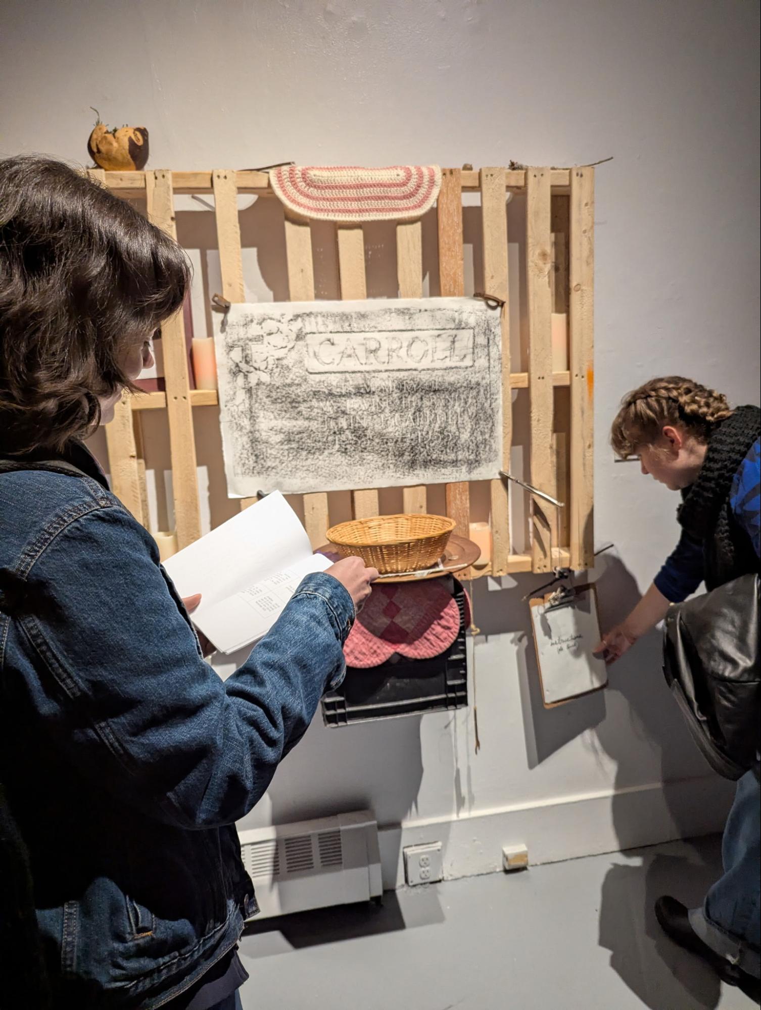 Installation view: pallet altar with objects